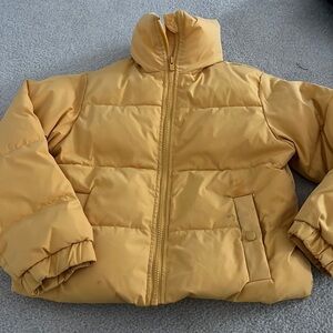 Yellow puffer jacket